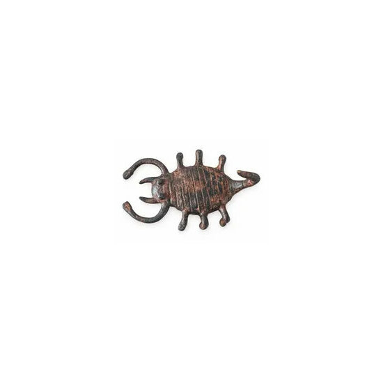 Top view of a bronze scorpion showing its body and legs