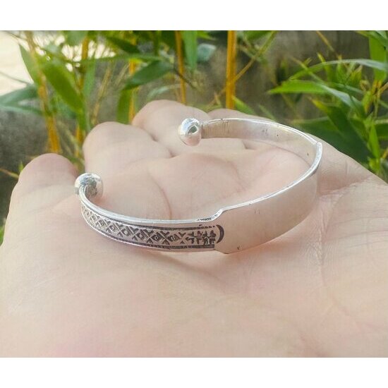 Hand-Engraved Silver Alloy Bracelet � Geometric Pattern Detail, Held in Hand
