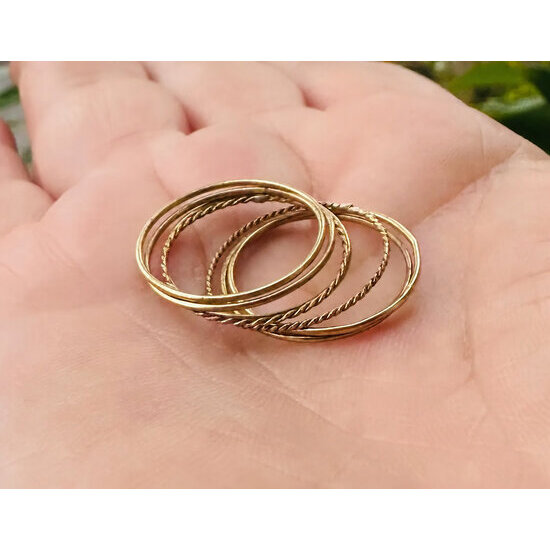 Handmade Seven-Band Brass Ring � Shown in the Palm